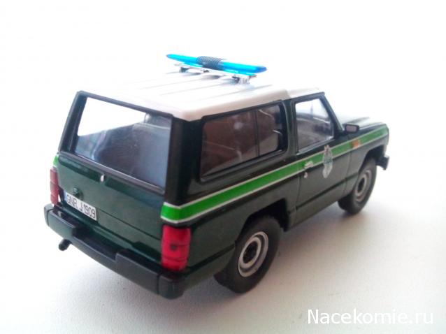 Полицейские Машины Мира №54 - Nissan Patrol 1985